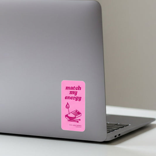 Pink card with a match illustration and 'match my energy' text on a pink background